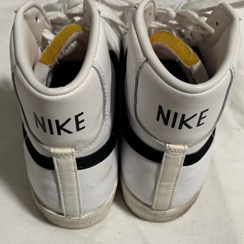 Nike White High-Top Sneakers with Black Stripe and Yellow Collar
